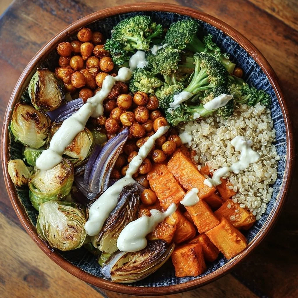 Delicious roasted veggie Buddha bowl filled with colorful vegetables and grains.