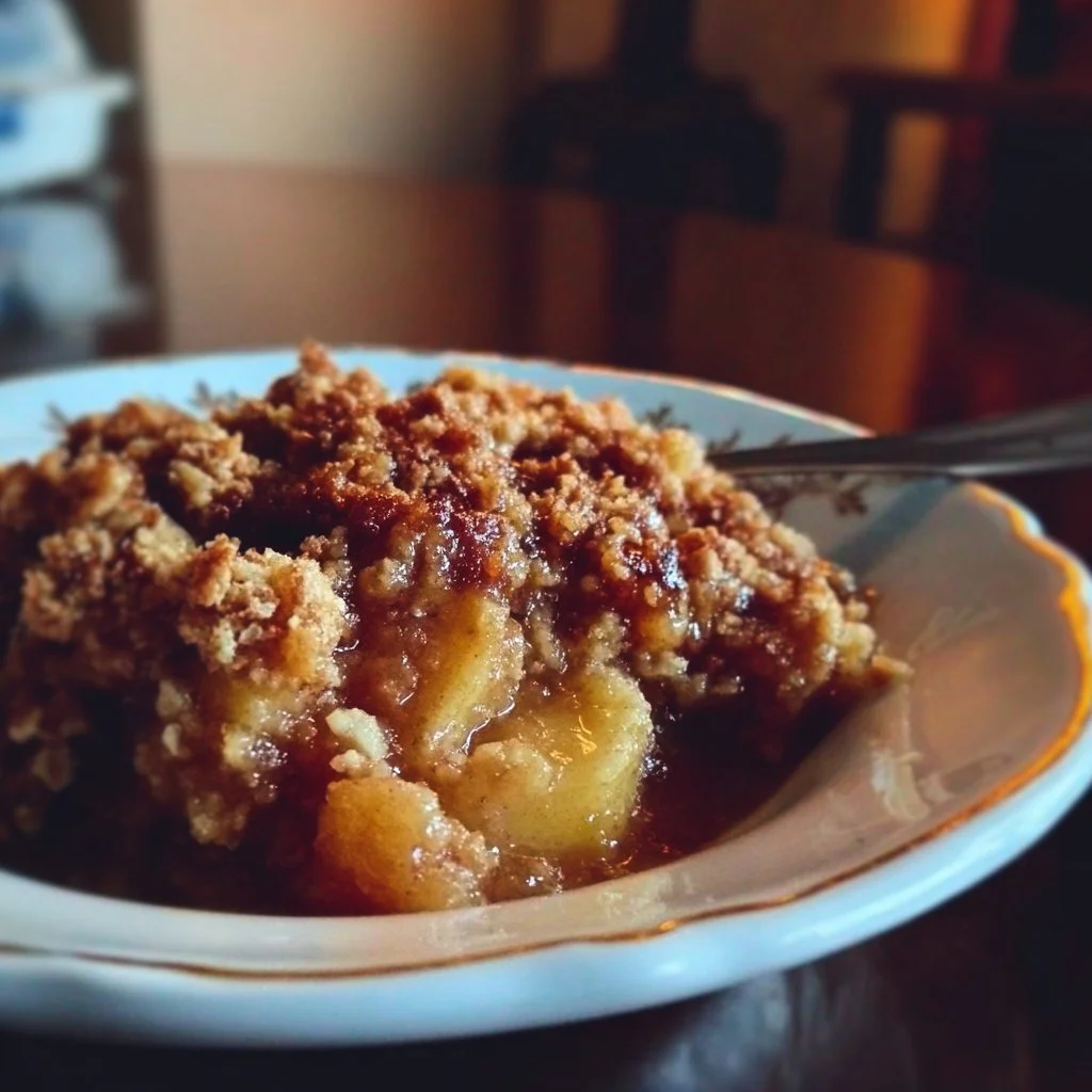Delicious gluten-free apple crisp topped with oats and cinnamon