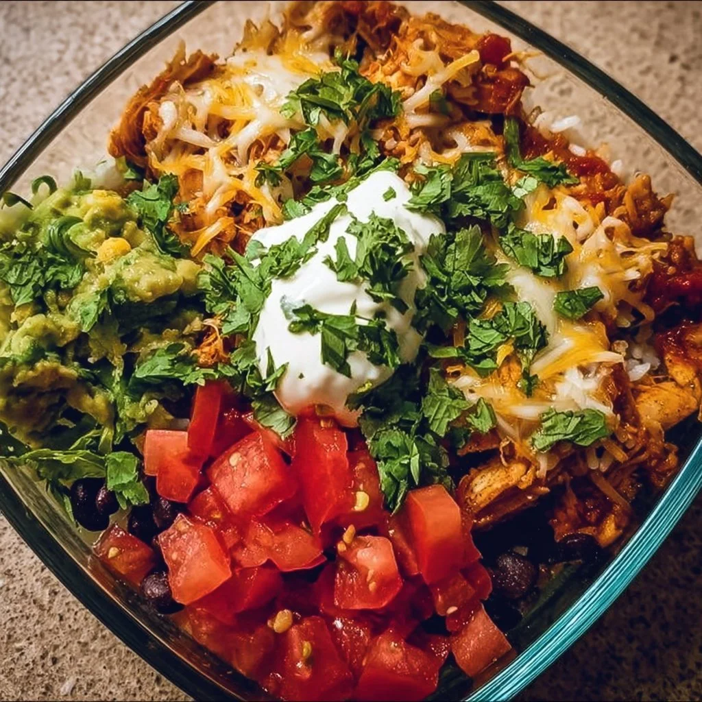 Delicious Chicken Enchilada Bowl topped with fresh ingredients